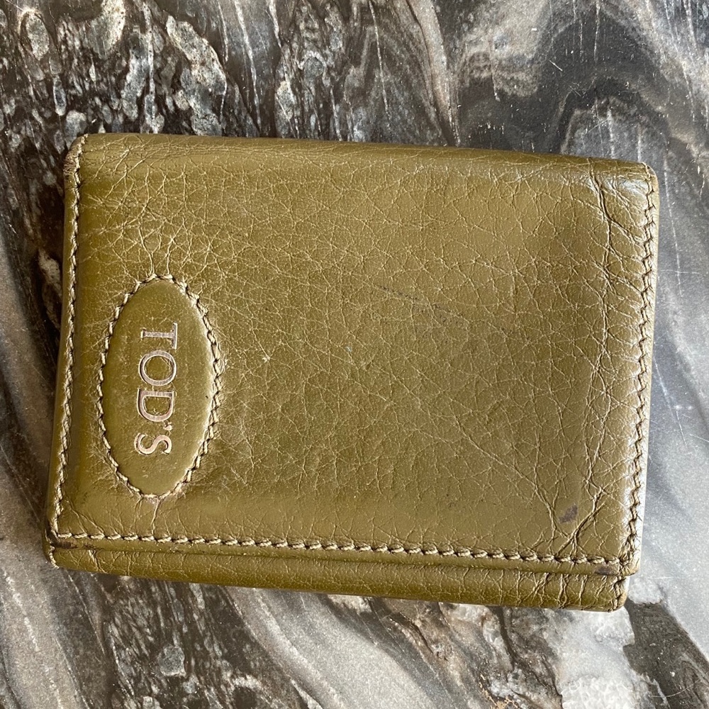 Tod’s trifold wallet in forest green